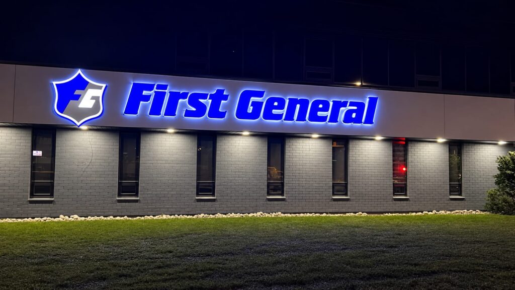 LED channel letters lit at night, First General, London, Ontario